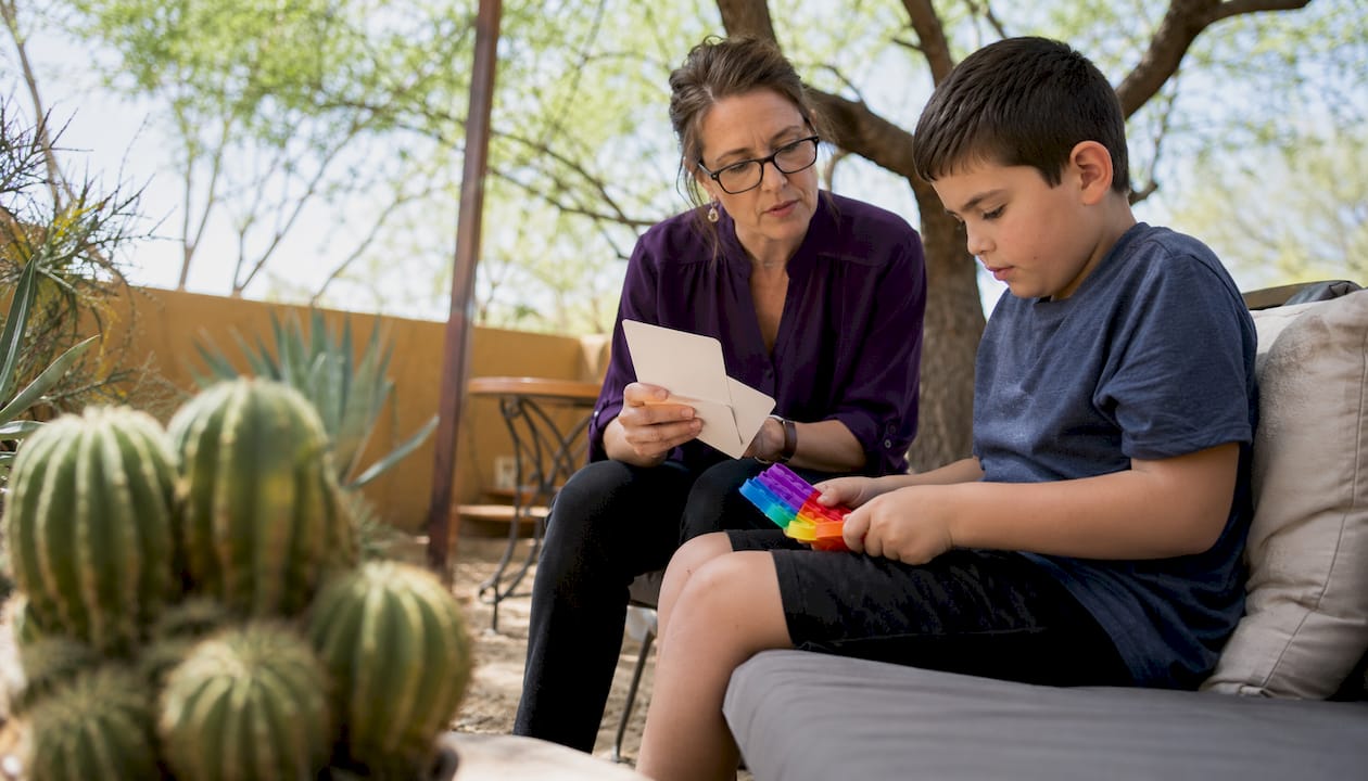 Therapist working with autistic child at Empower Academy