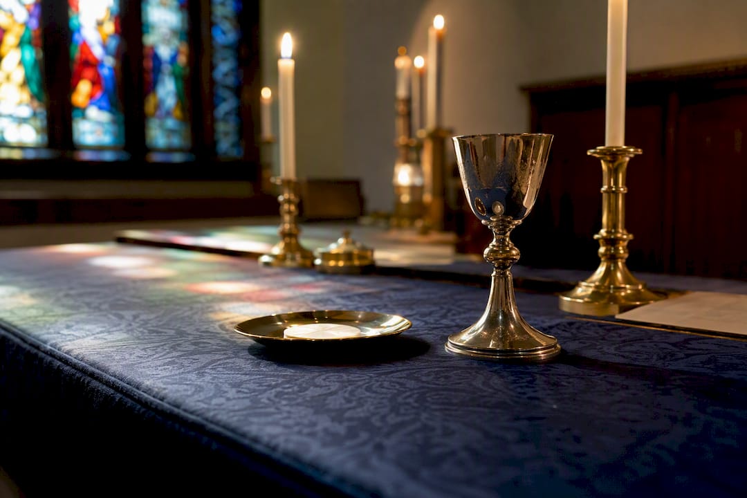 Anglican altar with chalice and candles
