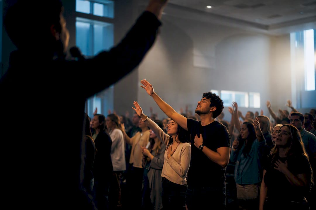 Pentecostal congregation worshipping in sanctuary