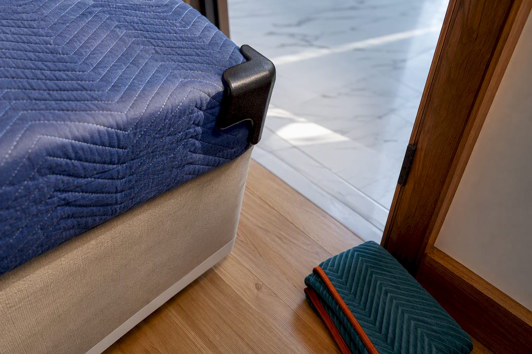 Corner guards protecting furniture at doorway