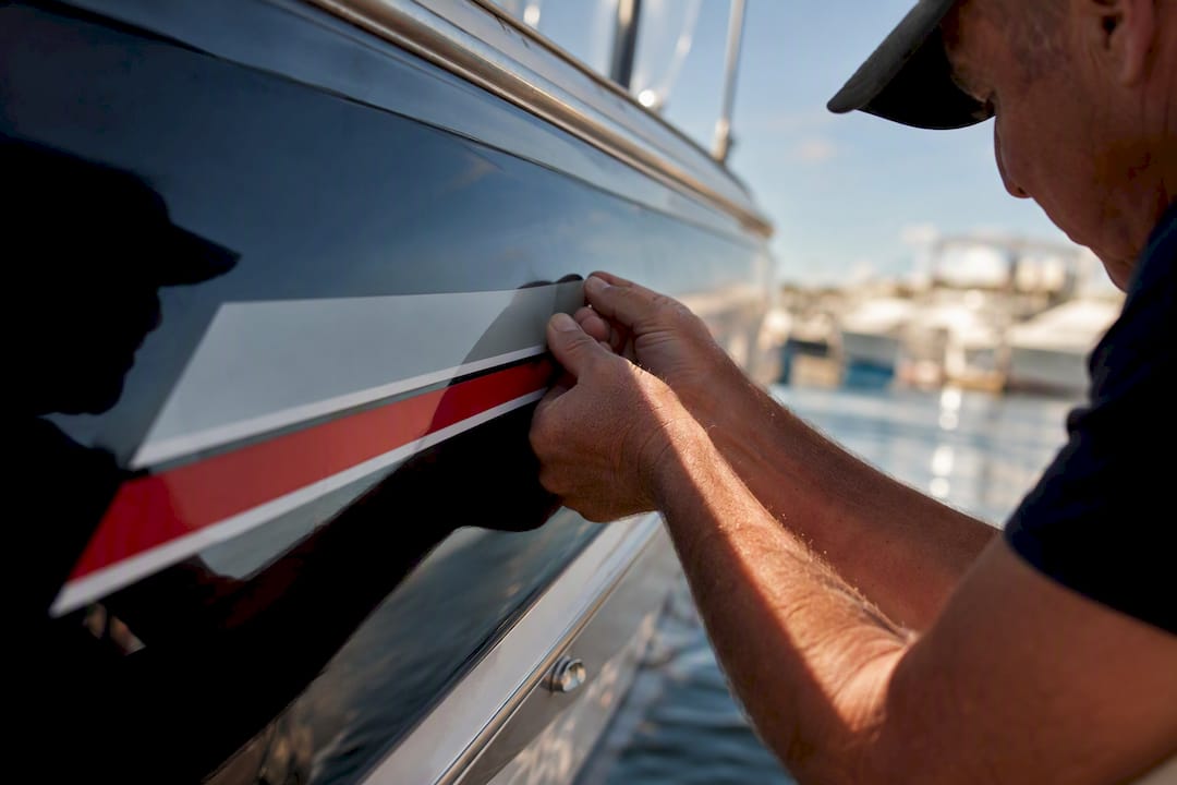 Close-up of marine vinyl decal edge sealing