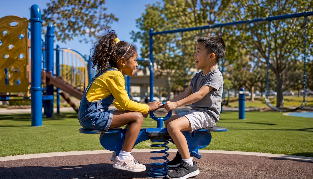 Safe playground layout with children playing