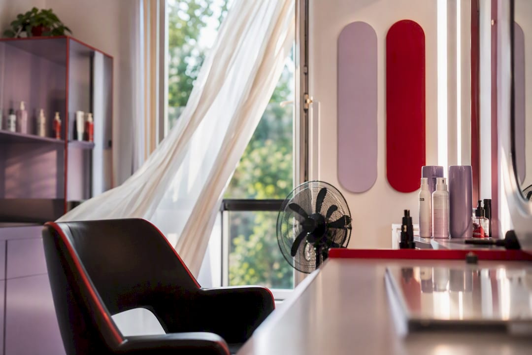 Salon colour station with open window and fan ventilating