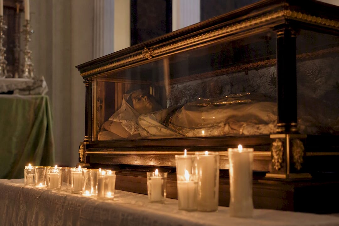 Chapel relic shrine with candlelight