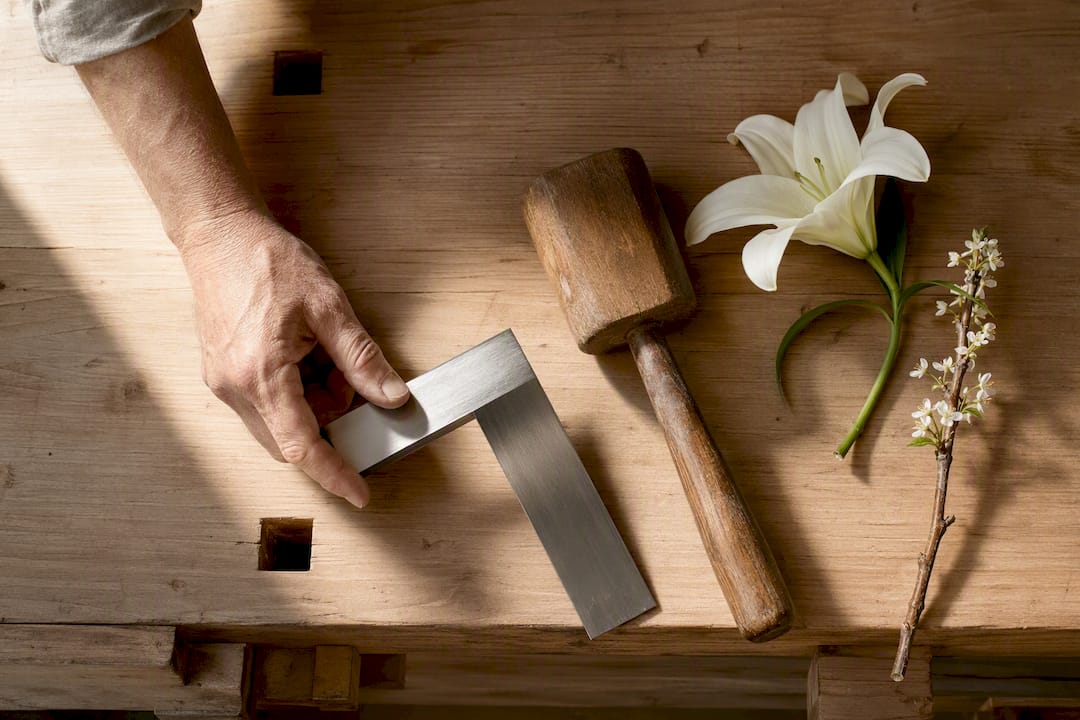St. Joseph symbols with carpenter tools and lily