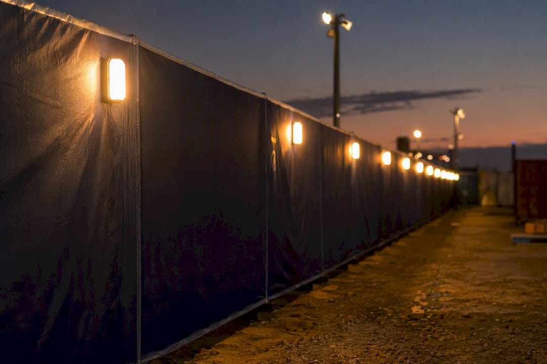 Security audit checklist: a test-first walkaround guide 8 Construction site perimeter lighting at dusk