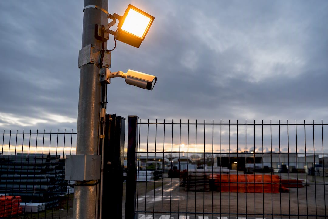 What is a construction security risk assessment? 8 Construction site security lighting and camera close-up