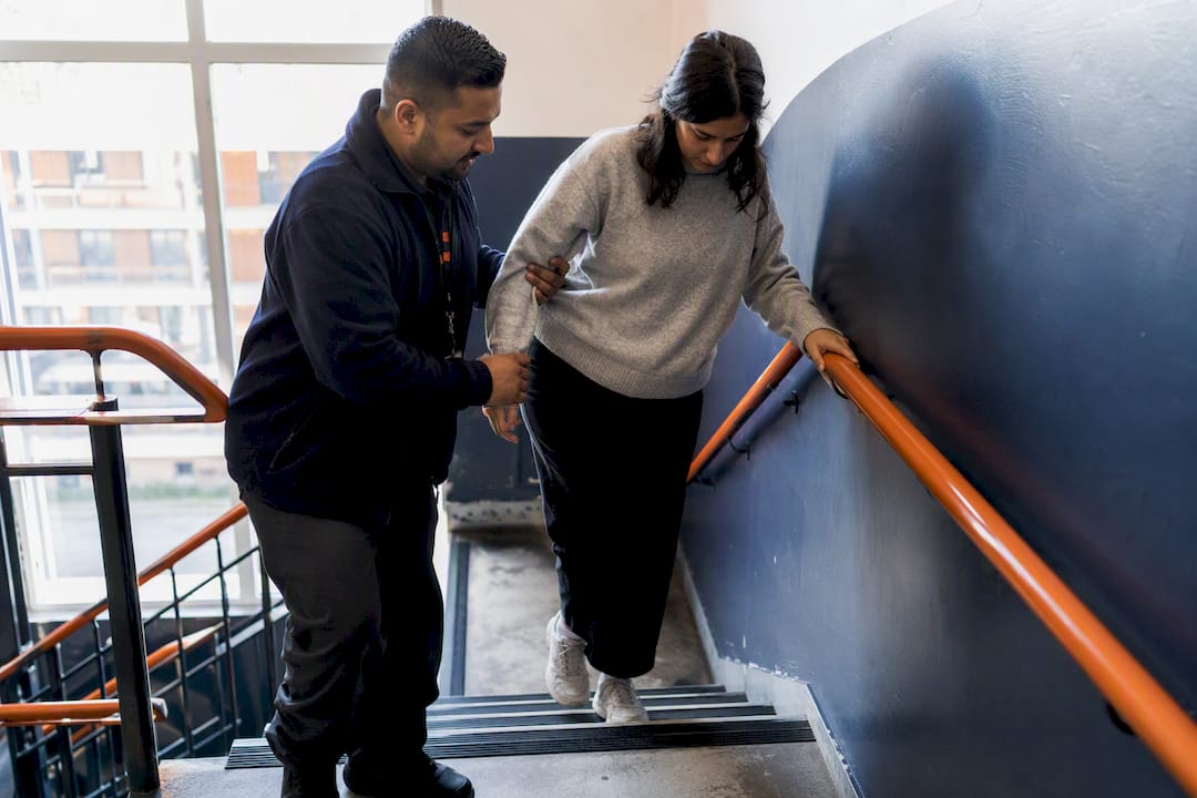 A corporate office security plan needs these four moves first 8 Assisting mobility-impaired person in office stairwell drill
