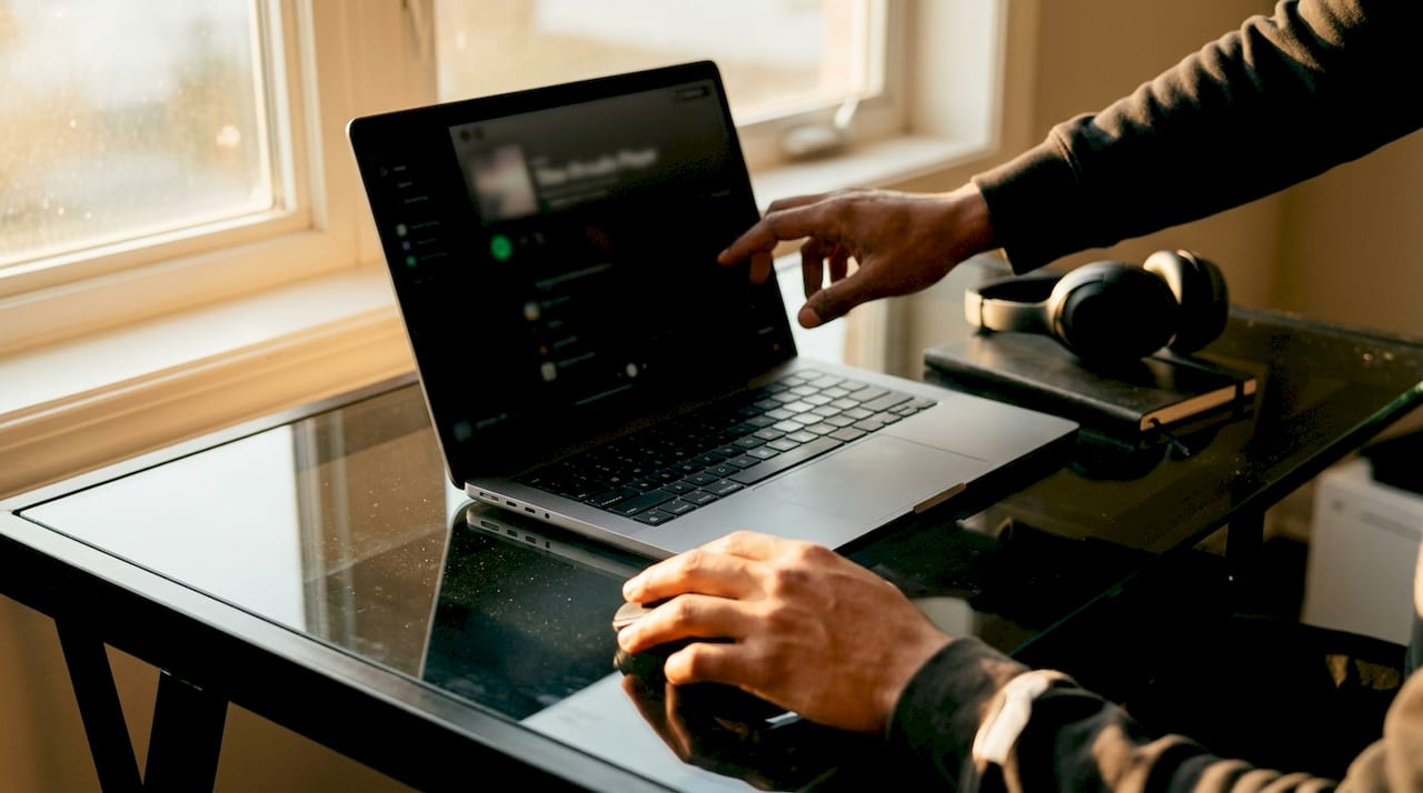 Hands customizing audio player controls