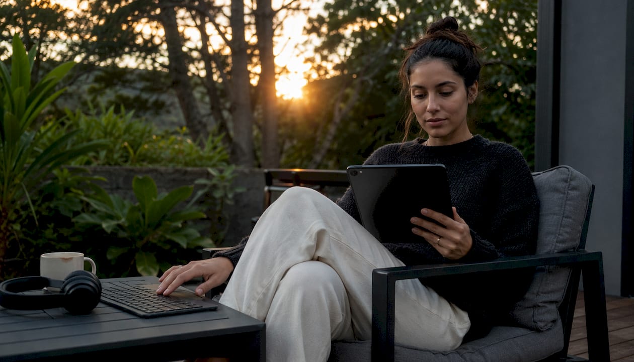Hands typing tablet for article audio conversion