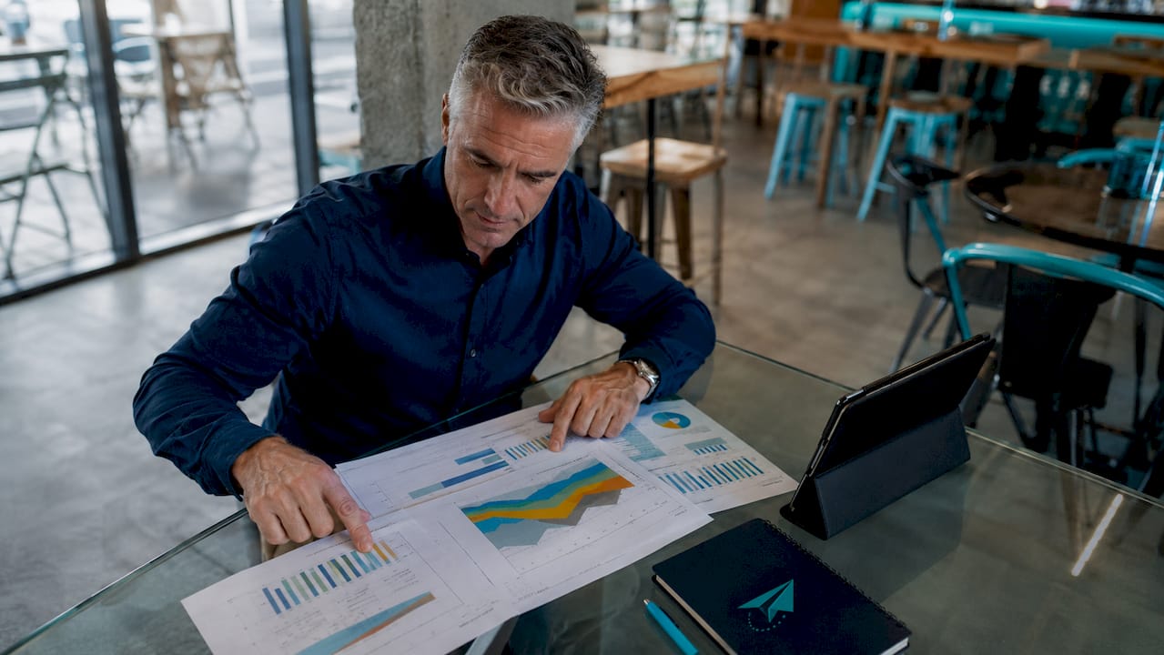 Financial advisor calculating retirement income projections