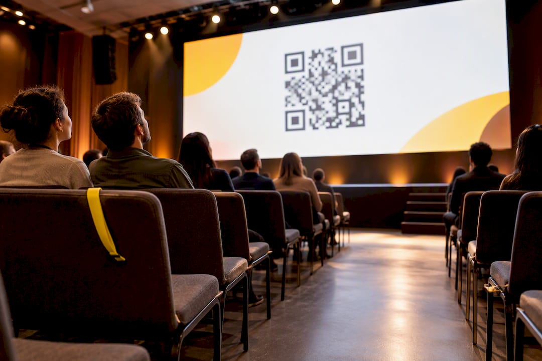 Large QR code on conference stage screen