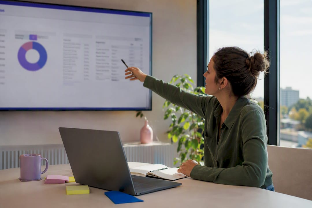 Hands analyzing keyword intent data on desk