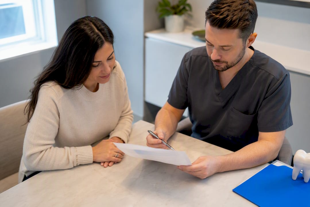 Patient reviewing dental treatment estimate