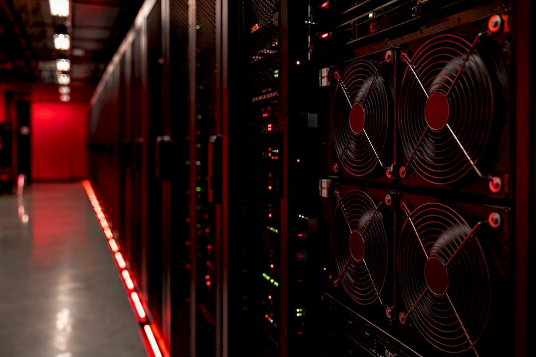 Server room illuminated with red and black lighting