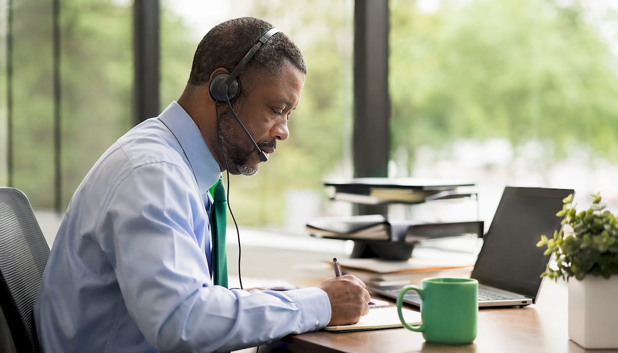 Staff managing health plan in office workspace