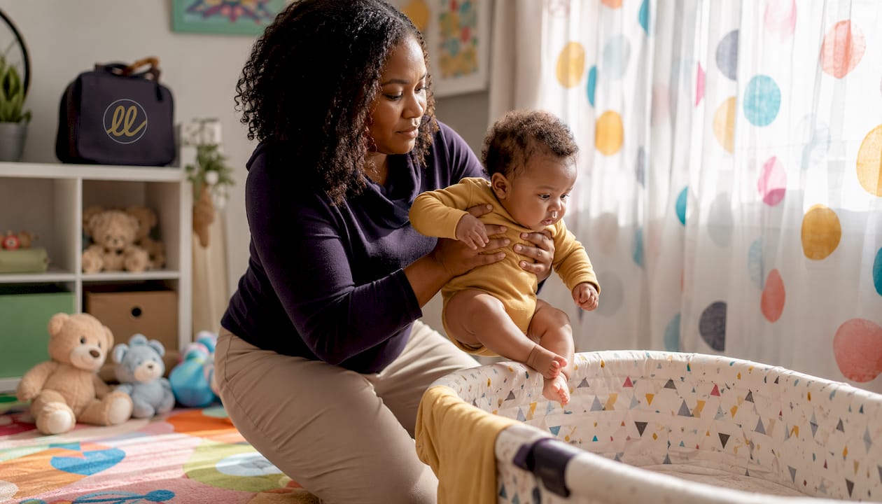Mother practicing pick-up put-down method