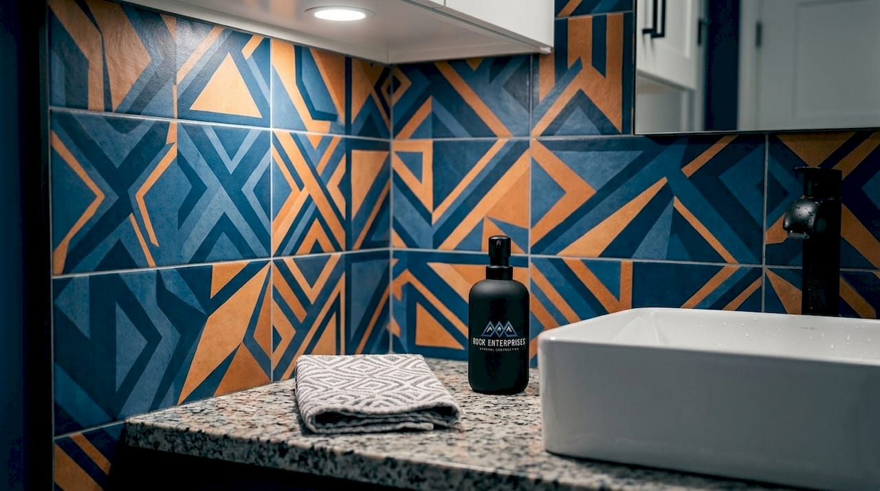 Close-up of contemporary bathroom tile and fixtures