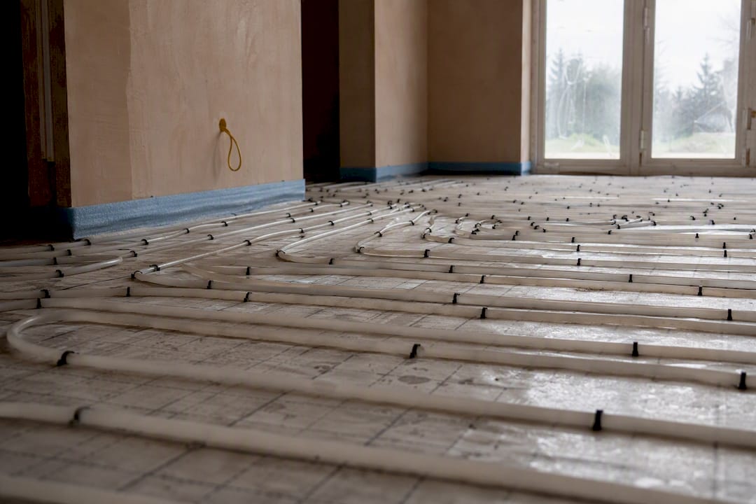 Underfloor heating pipes laid in warm slab floor