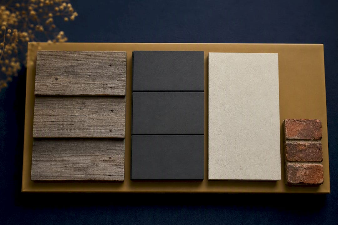 Timber composite render and brick samples