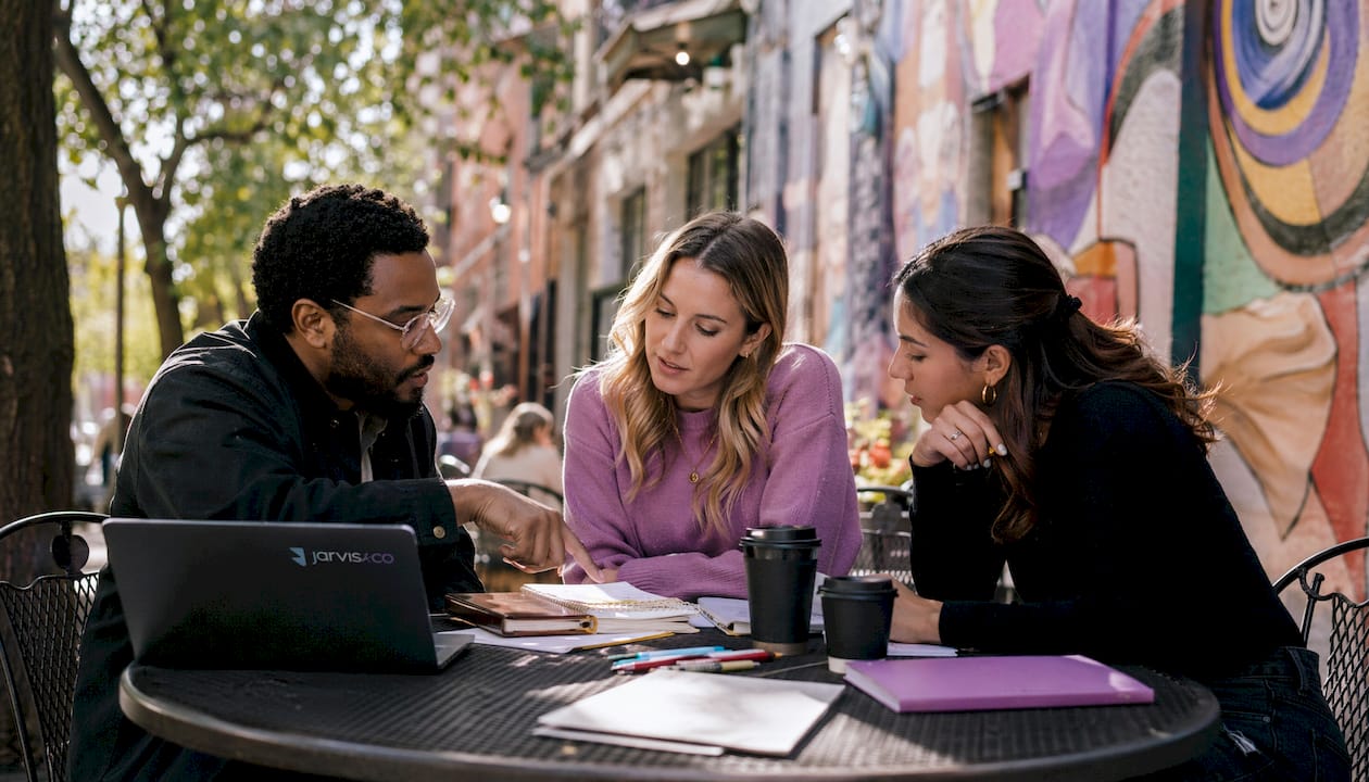 Team discussing brand positioning at table