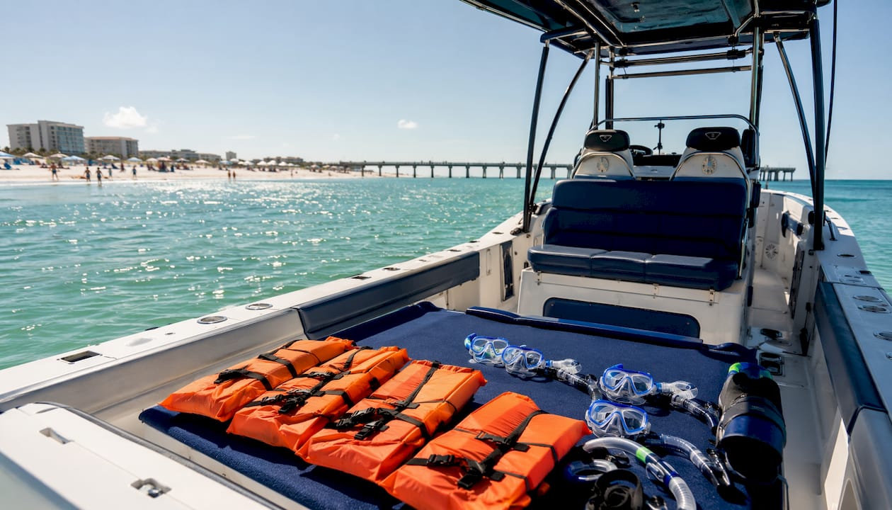 Safety and snorkel gear prepared on boat deck