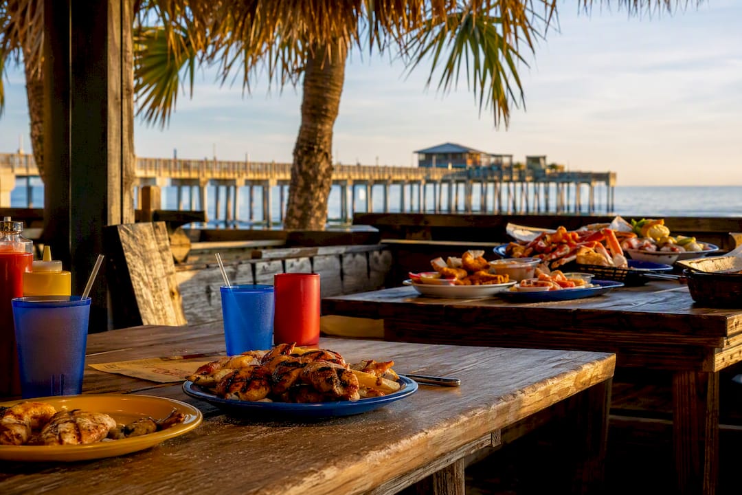 Casual seafood restaurant table set for family meal