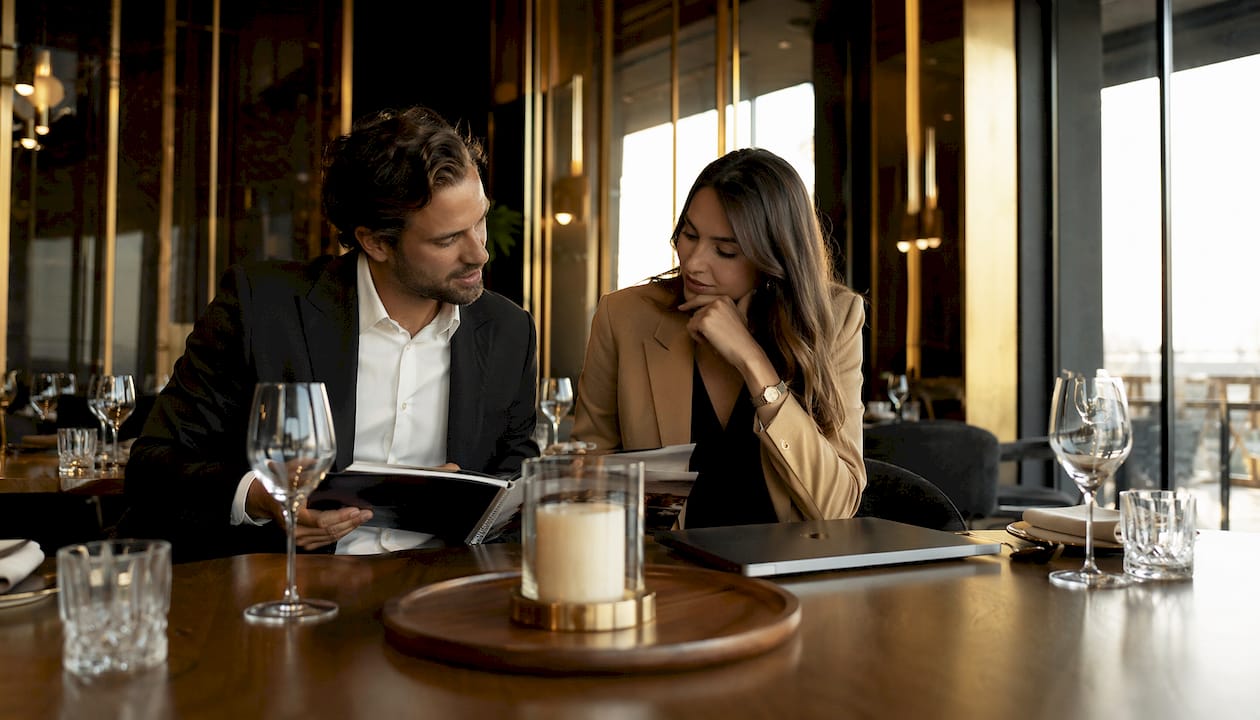 Couple discussing wedding after party venue options