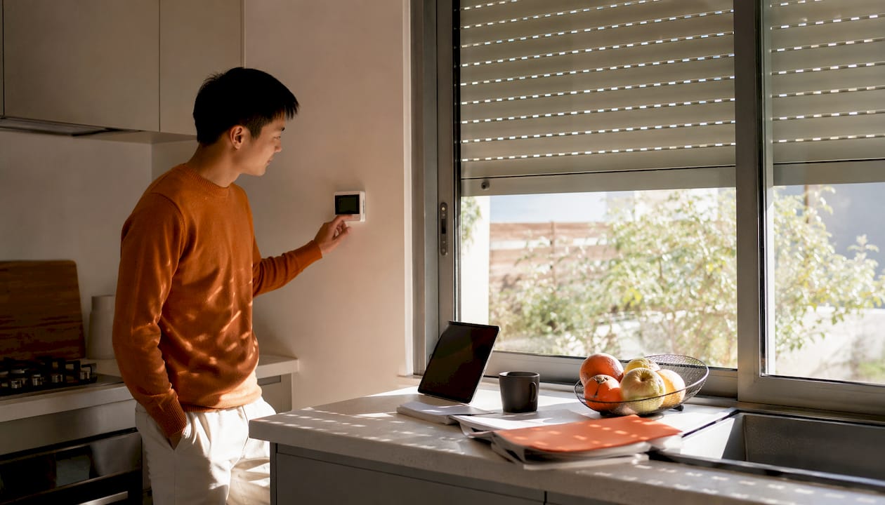 Home office with smart shutter and thermostat control