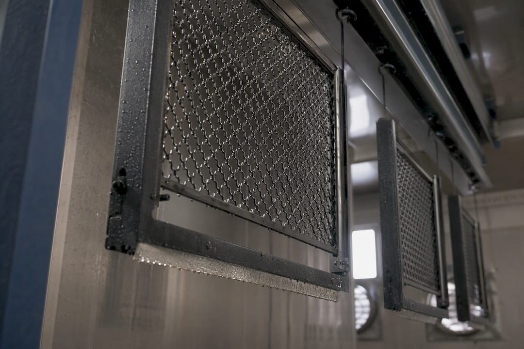 Security screen mesh in salt spray corrosion test chamber