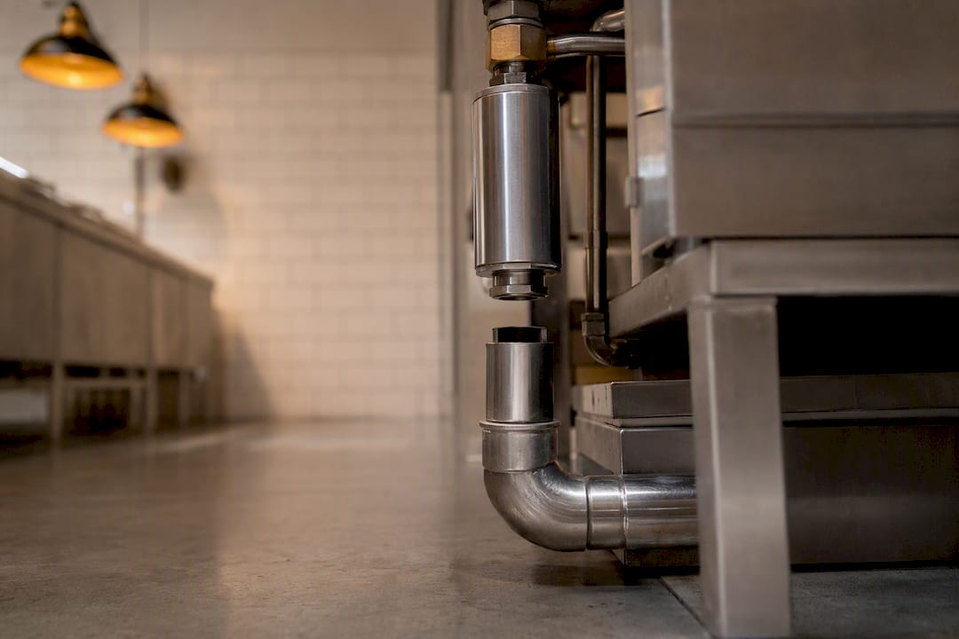 Vent and air gap installation on oven drain pipe