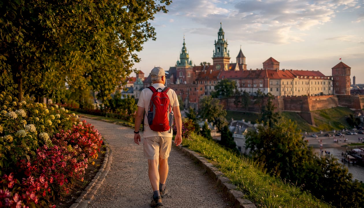 Solo male walking towards Wawel Castle Krakow