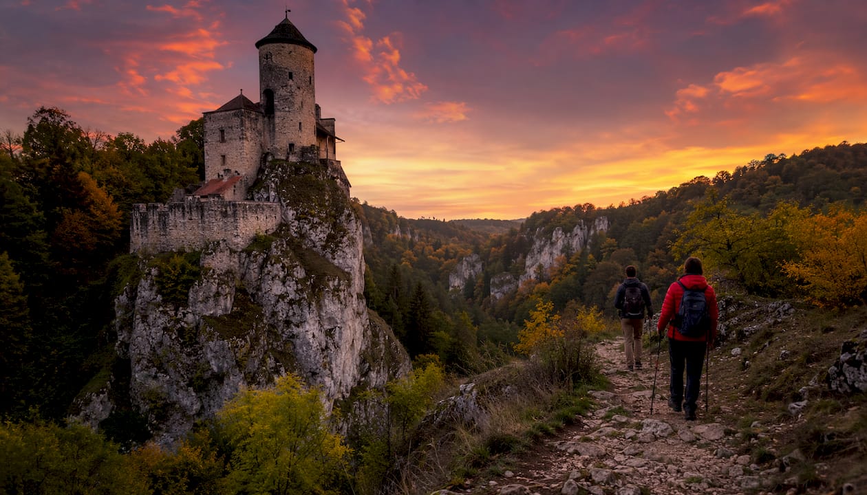 Ojców Castle ruins on limestone outcrop in autumn