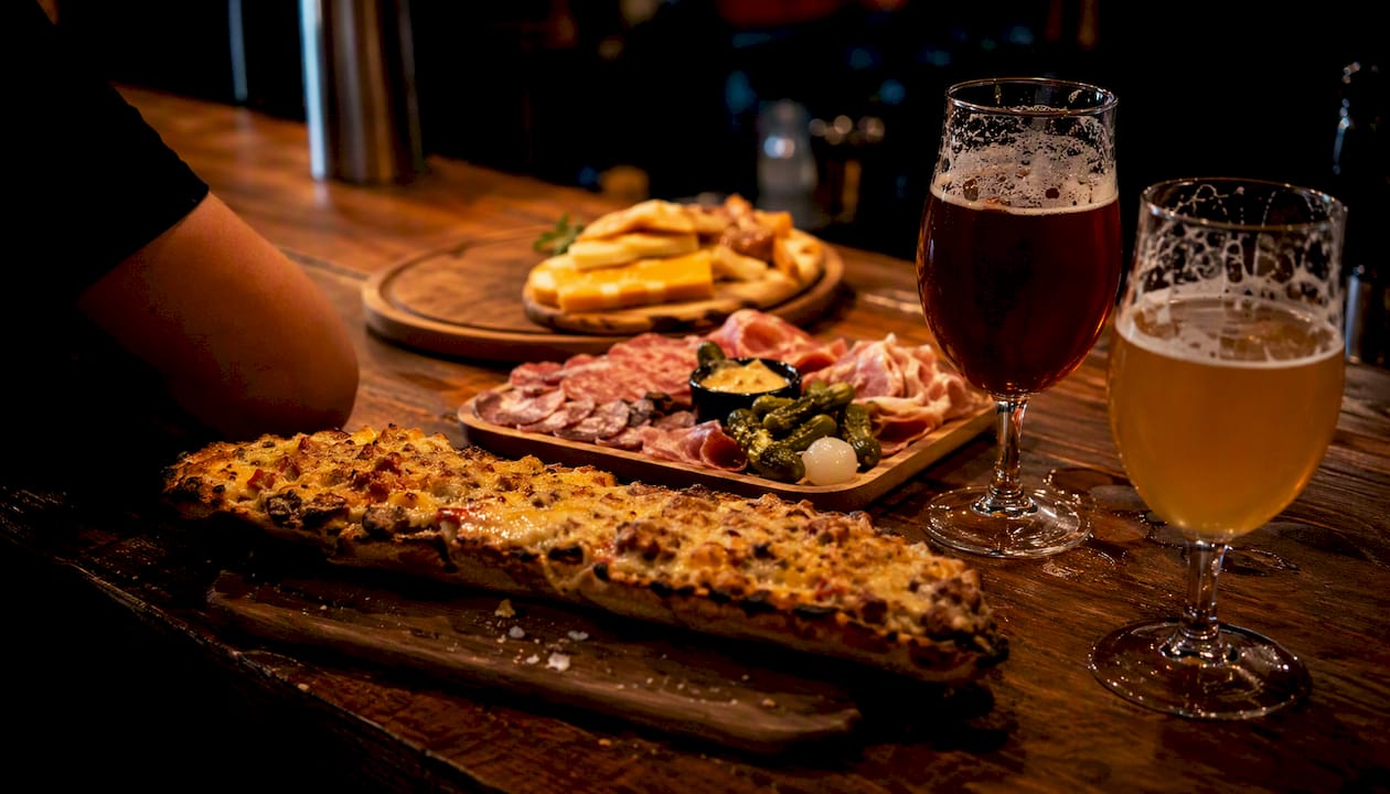 Table with Polish snacks and craft beers