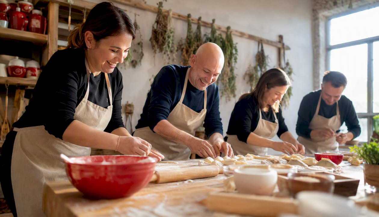 Corporate group cooking Polish cuisine pierogi