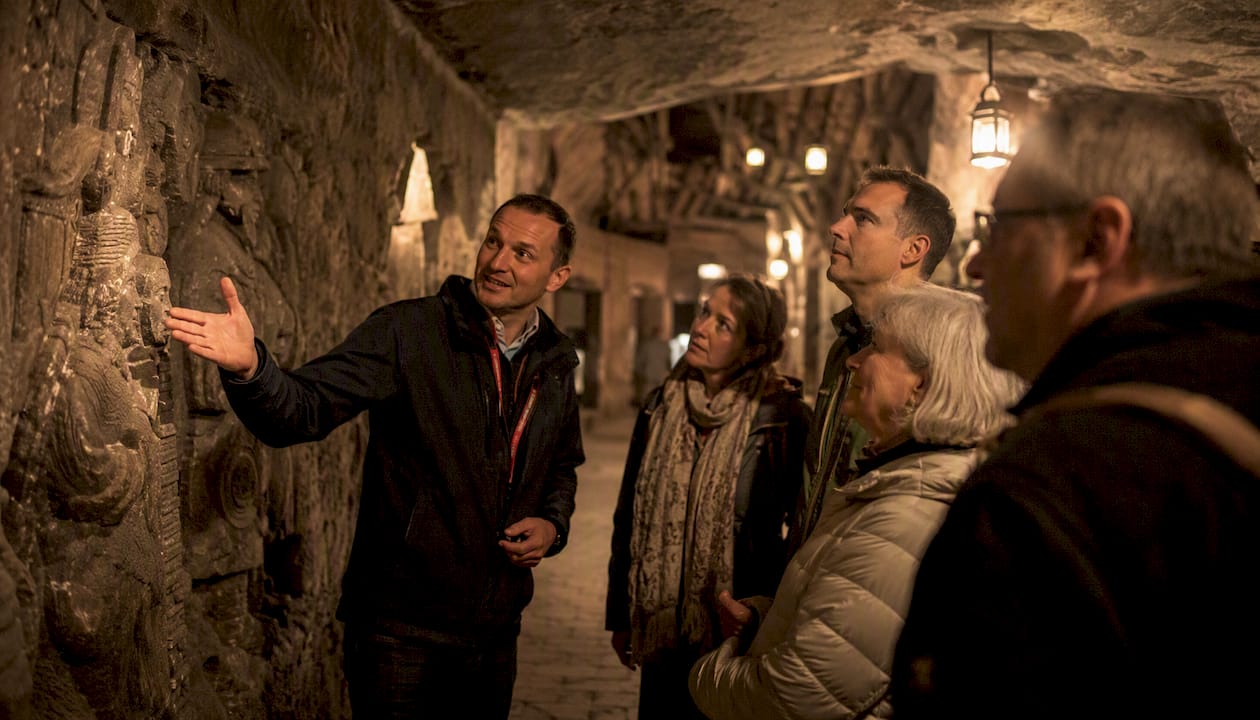 Corporate group touring Wieliczka Salt Mine interior