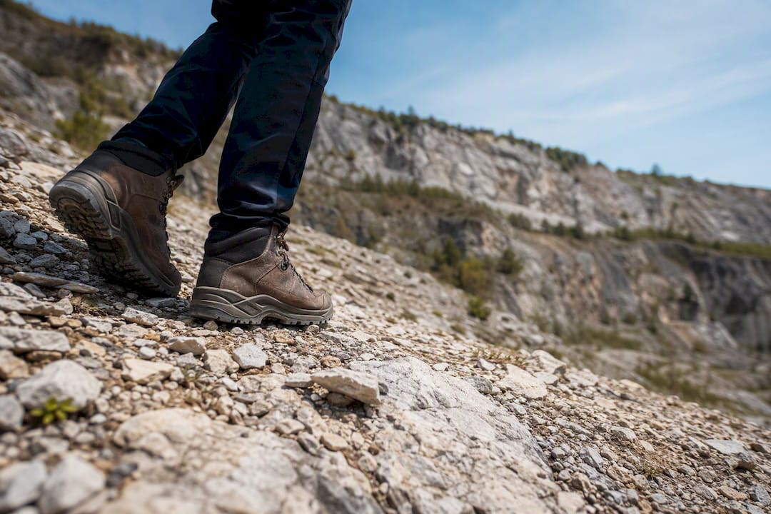 Hiking boots on rocky Liban Quarry terrain