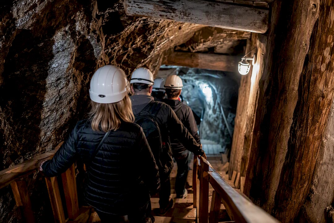 Visitors descending Wieliczka mine staircase