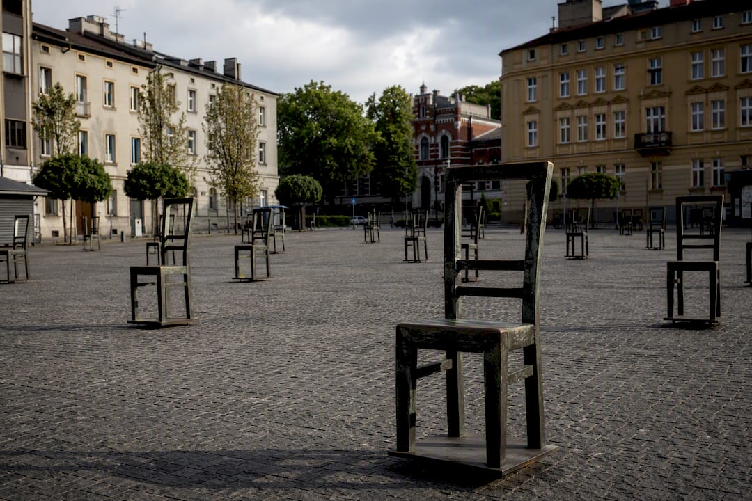 Empty chairs at Ghetto Heroes Square memorial