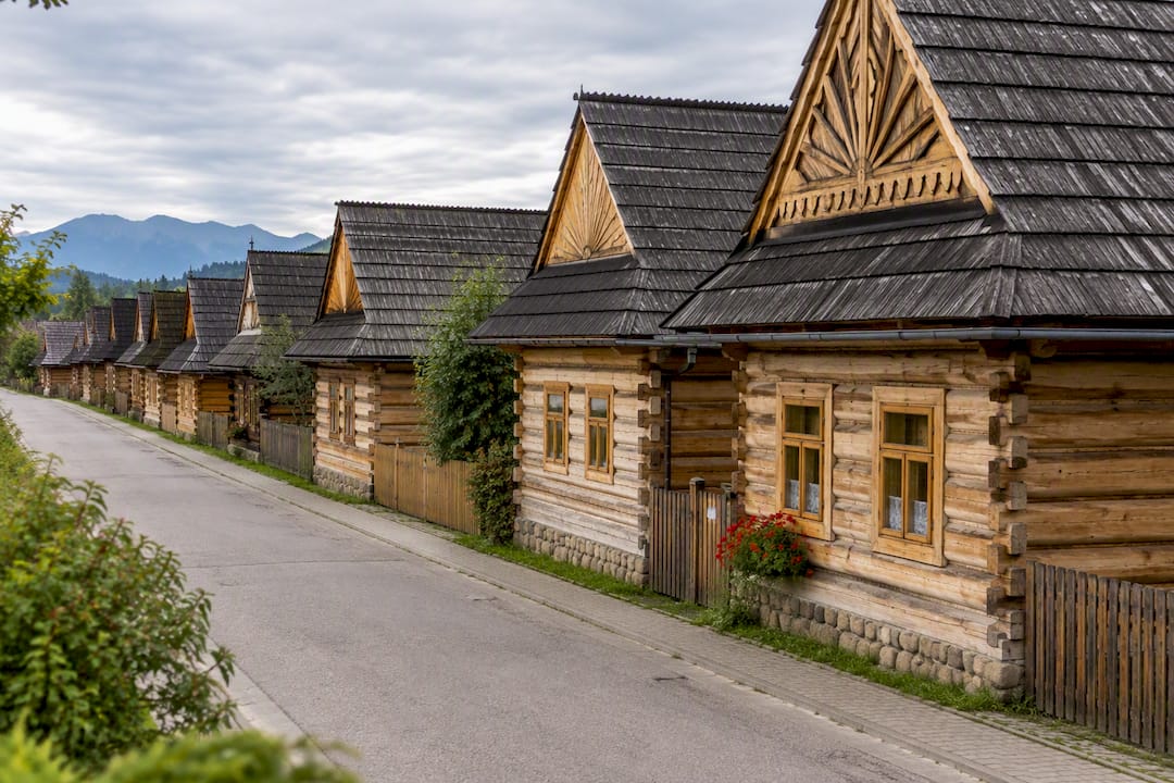 Traditional wooden cottages along Chochołów street