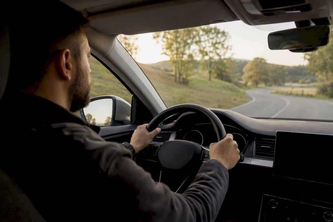 Technician performing dynamic calibration road test
