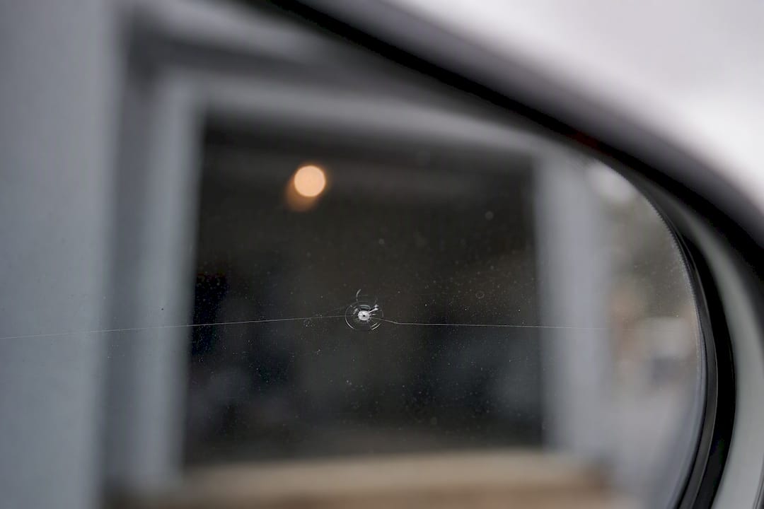 Close-up of chip and crack on a windshield