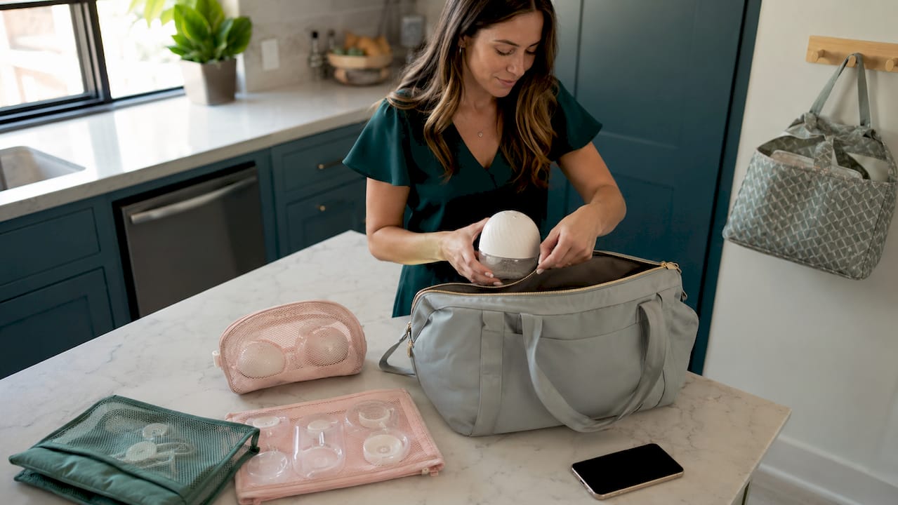 Woman packing wearable breast pump accessories