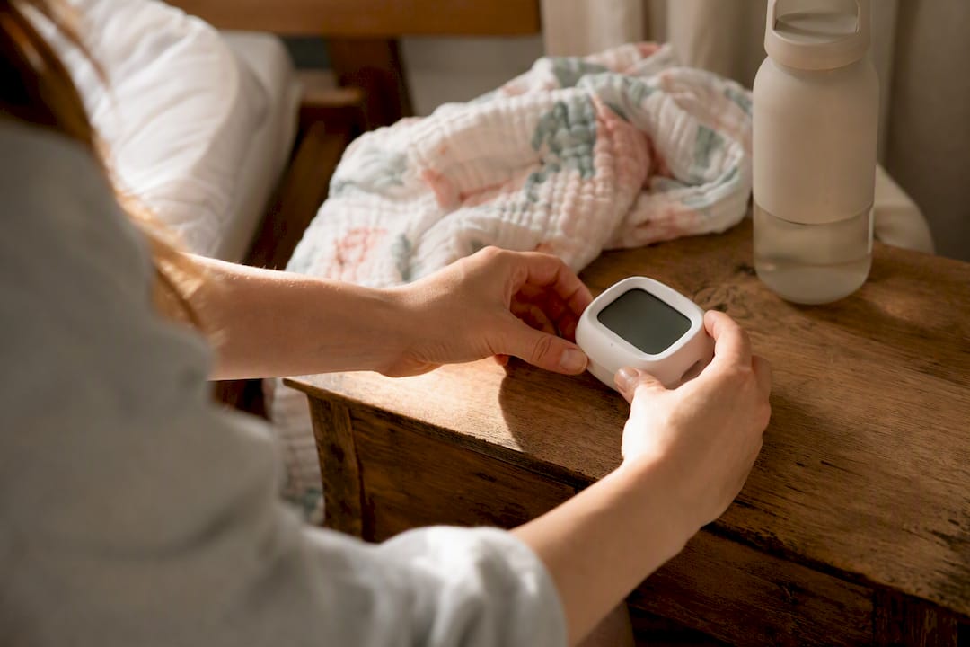 Mother tracking milk output in nursery