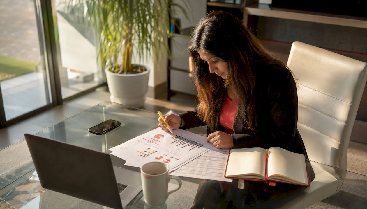 Tech marketer reviewing brand safety documents