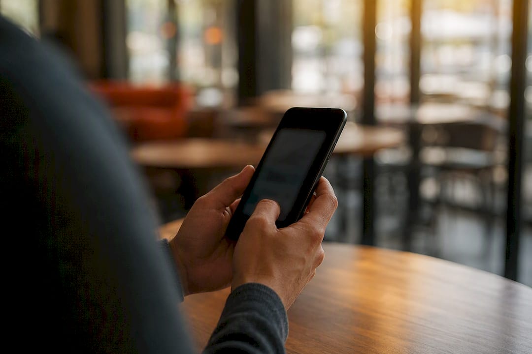 Hands connecting Instagram account on phone