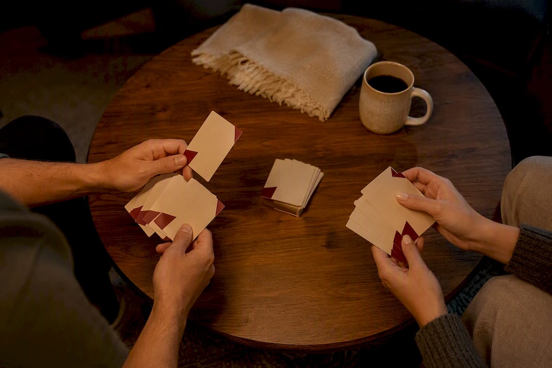 Couple playing a discreet conversation card game