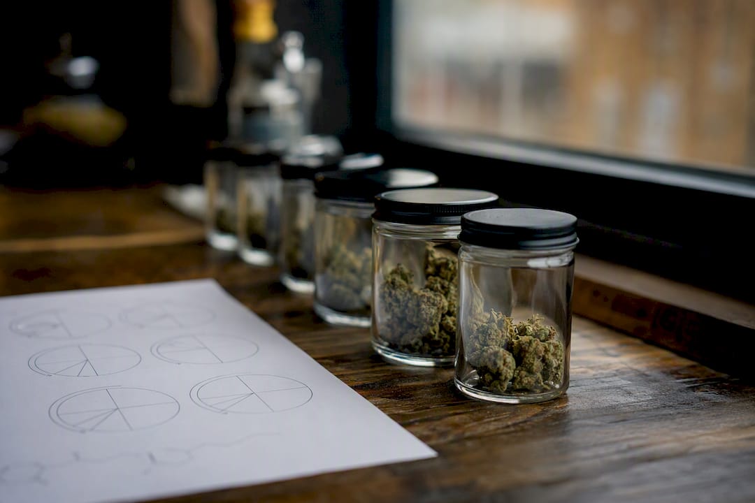 Aroma jars with cannabis terpenes and lab chart