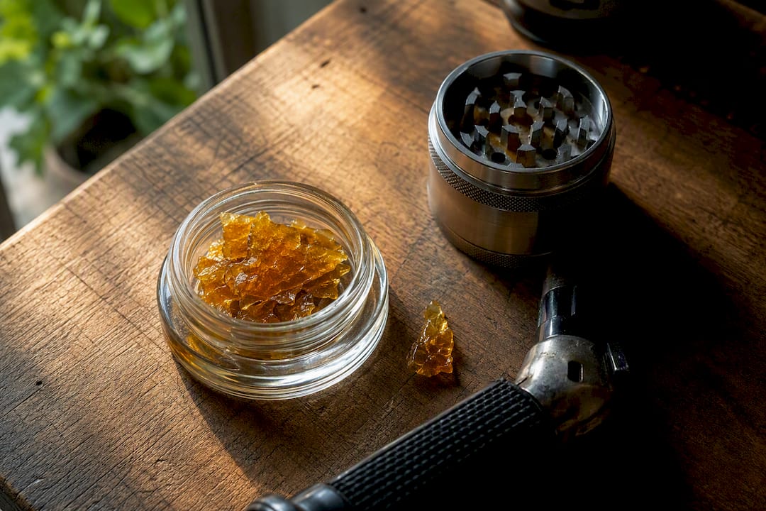 Cannabis concentrate jar with grinder and torch