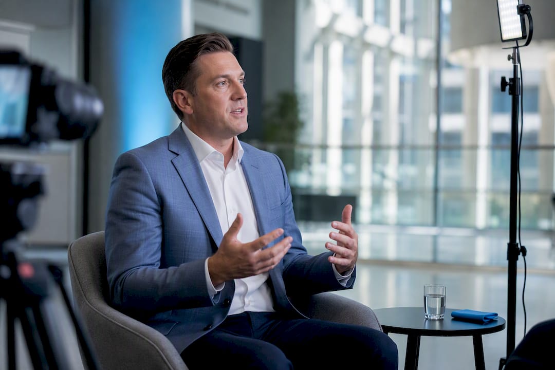 Subject answering questions during corporate interview